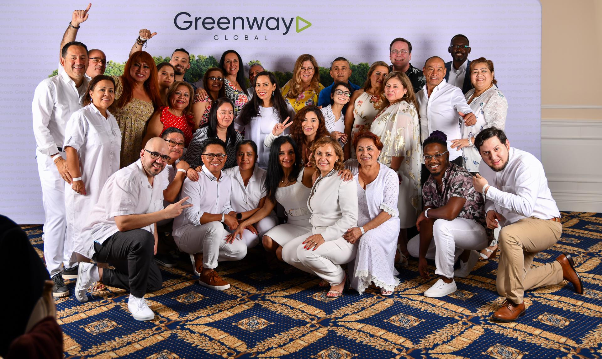 corporate event planner Miami team and client group at corporate event showcasing successful experience