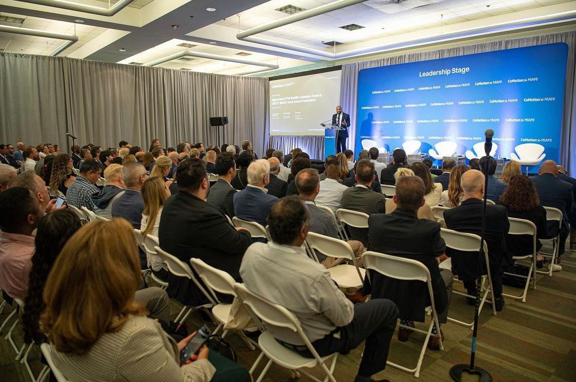 corporate event planner Miami conference and meeting event with speaker and audience